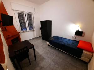 Postel nebo postele na pokoji v ubytování B&B Confine