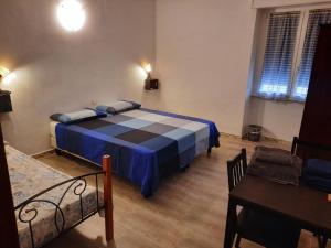 Postel nebo postele na pokoji v ubytování B&B Confine