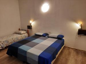 Postel nebo postele na pokoji v ubytování B&B Confine