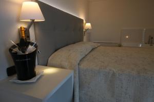 Postel nebo postele na pokoji v ubytování Eraclea Palace Hotel 4 stelle S