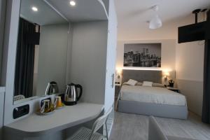 Postel nebo postele na pokoji v ubytování Eraclea Palace Hotel 4 stelle S