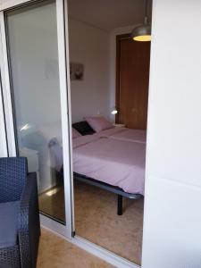 Posteľ alebo postele v izbe v ubytovaní Appartement Torre La Mata
