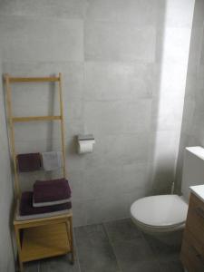 Een badkamer bij Le Pré