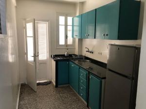 Familly Apartement Agdal Rabat centre tesisinde mutfak veya mini mutfak
