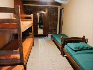 Cama ou camas em um quarto em Hostel Lazy Gaucho