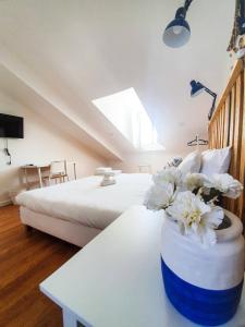 Кровать или кровати в номере PÊPA Guesthouse