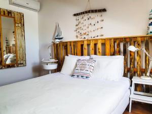 Кровать или кровати в номере PÊPA Guesthouse