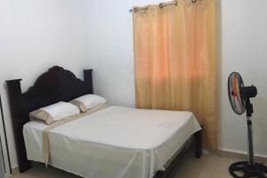 Ένα ή περισσότερα κρεβάτια σε δωμάτιο στο Comodo apartamento en el centro de la ciudad