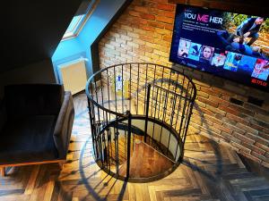 Televízia a/alebo spoločenská miestnosť v ubytovaní Old Town Luxury Apartments Zgorzelec