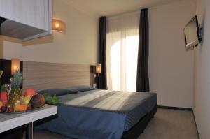 Posteľ alebo postele v izbe v ubytovaní Morcavallo Hotel & Wellness