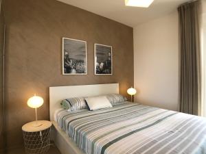 Posteľ alebo postele v izbe v ubytovaní Vista Mare Apartment con parcheggio privato