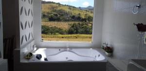 Foto dalla galleria di Pousada Princesa Do Vale a Belo Vale Altre 78 foto