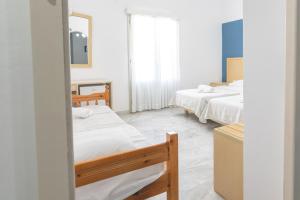 Postel nebo postele na pokoji v ubytování Carlos Pension
