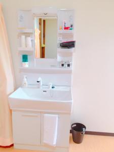 Kylpyhuone majoituspaikassa Guest House Kominka Nagomi