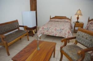 Postel nebo postele na pokoji v ubytování Hotel Ipsan Nah