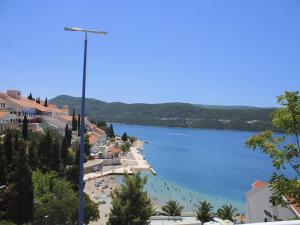 a view of a beach in a body of water at Apartments Jurković in Neum