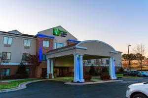 a hotel with a sign on the front of it at Holiday Inn Express Hotel & Suites Kinston, an IHG Hotel in Kinston