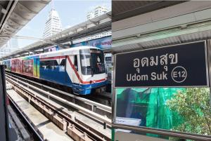 a train on the tracks at a train station at Gfeel Hostel in Bangkok +9 photos