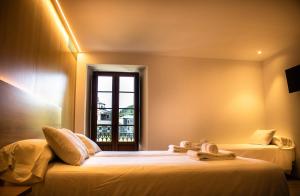A Casa da Botica客房内的一张或多张床位