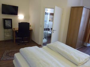 TV a/nebo společenská místnost v ubytování Hotel Alte Post