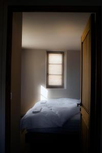 Krevet ili kreveti u jedinici u okviru objekta The View - Gite Mont Dore