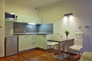 Kuchyňa alebo kuchynka v ubytovaní Apartmány Čeladná
