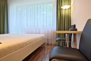 Posteľ alebo postele v izbe v ubytovaní Apartmány Čeladná