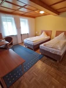 Ένα ή περισσότερα κρεβάτια σε δωμάτιο στο Landhotel Adler