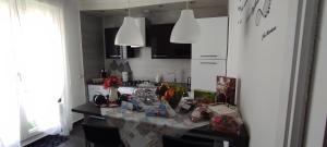 a kitchen with a counter top in a room at LA TERRAZZA in Falconara Marittima +38 photos
