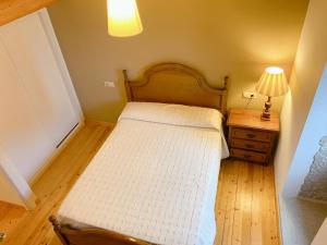 Ένα ή περισσότερα κρεβάτια σε δωμάτιο στο A Casa de Feli