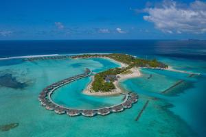 an aerial view of an island in the ocean at Cinnamon Dhonveli Maldives - 02 Kids Stay Free & One-way Free by Speedboat in North Male Atoll +195 photos