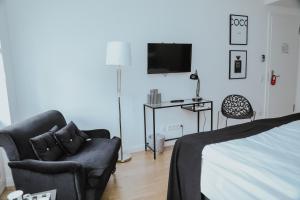 TV a/nebo společenská místnost v ubytování Boutique Hotel Classico Bremen