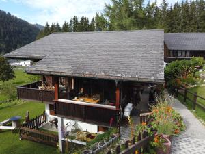 an aerial view of a house with a roof at Jack in Schwarzsee