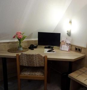 TV a/nebo společenská místnost v ubytování Hotel Eberbacher Hof