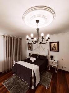 Ένα ή περισσότερα κρεβάτια σε δωμάτιο στο Quinta Santa Lucrécia