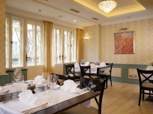 Restoran või mõni muu söögikoht majutusasutuses EA Apartmány Mozart
