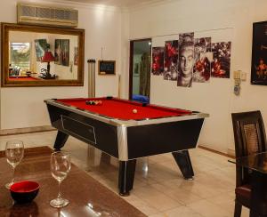 Biliár nebo kulečník v ubytování Siri Villas Pattaya