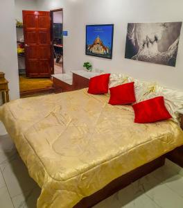 Postel nebo postele na pokoji v ubytování Siri Villas Pattaya