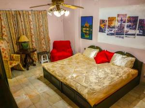 Postel nebo postele na pokoji v ubytování Siri Villas Pattaya