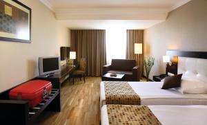 A bed or beds in a room at Eresin Hotels Topkapı Még 33 kép