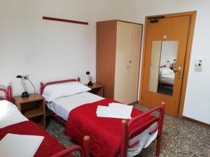 Postel nebo postele na pokoji v ubytování Ostello S. Fosca - CPU Venice Hostels