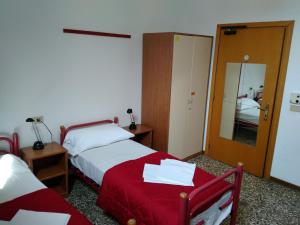Postel nebo postele na pokoji v ubytování Ostello S. Fosca - CPU Venice Hostels