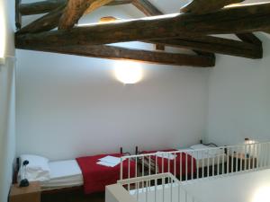 Postel nebo postele na pokoji v ubytování Ostello S. Fosca - CPU Venice Hostels