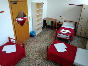 Postel nebo postele na pokoji v ubytování Ostello S. Fosca - CPU Venice Hostels