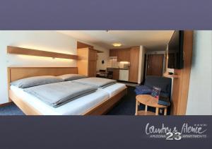 Η κουζίνα ή μικρή κουζίνα στο Arizona 23 Apartments [25+ ADULTS ONLY]