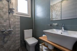 Kylpyhuone majoituspaikassa MG Villas & Suites