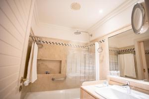 Ванная комната в Hotel Playa Victoria