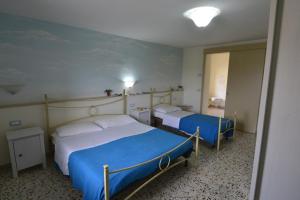 Postel nebo postele na pokoji v ubytování Affittacamere da Beppe