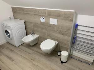Kúpeľňa v ubytovaní Nowe mieszkanie w idealnej okolicy + 12 fotografií