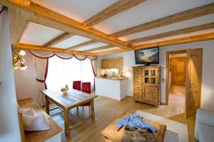 Televízia a/alebo spoločenská miestnosť v ubytovaní Wellnessresort Seiwald **** Superior